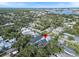 Charming neighborhood featuring lush green trees and a beautiful waterway in this aerial view at 507 S Pine St, New Smyrna Beach, FL 32169