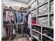 Spacious walk-in closet with custom shelving and ample storage for clothes and accessories at 507 S Pine St, New Smyrna Beach, FL 32169