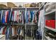 Large walk-in closet with organized clothing racks and shelf space for bags and shoes at 507 S Pine St, New Smyrna Beach, FL 32169