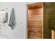 Relaxing cedar sauna adjacent to the updated bathroom with modern fixtures at 507 S Pine St, New Smyrna Beach, FL 32169