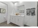 Elegant bathroom with double vanity, modern fixtures, and stylish decorations at 5630 Stockade Blvd, St Cloud, FL 34771