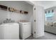 Convenient laundry room equipped with modern washer and dryer units at 5630 Stockade Blvd, St Cloud, FL 34771