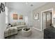 Cozy living room with modern furniture, movie posters and a comfortable couch at 5630 Stockade Blvd, St Cloud, FL 34771