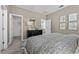 Relaxing main bedroom featuring modern décor, closet access, and bright natural light at 5630 Stockade Blvd, St Cloud, FL 34771