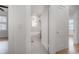 Bathroom entrance featuring tile floors and tub with window at 622 S Ingraham Ave, Lakeland, FL 33801