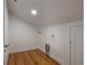 Bright laundry area with hardwood floors and utility connections at 622 S Ingraham Ave, Lakeland, FL 33801