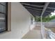 Charming porch featuring white railing at 622 S Ingraham Ave, Lakeland, FL 33801