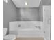 Bathroom featuring a soaking tub with tile surround and glass-enclosed shower at 625 Nighthawk Cir, Winter Springs, FL 32708