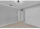 Bedroom featuring neutral walls and a double door closet at 625 Nighthawk Cir, Winter Springs, FL 32708
