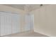Bright bedroom boasts closet and neutral walls at 625 Nighthawk Cir, Winter Springs, FL 32708
