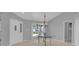 Inviting dining area with a decorative chandelier, large windows, and neutral paint at 625 Nighthawk Cir, Winter Springs, FL 32708