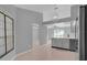 Bright kitchen featuring modern appliances and easy access to the dining and living areas at 625 Nighthawk Cir, Winter Springs, FL 32708