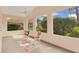 Relaxing screened lanai with comfortable seating and views of the backyard at 625 Nighthawk Cir, Winter Springs, FL 32708