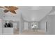 Open floor plan with gray walls and stylish ceiling fan at 625 Nighthawk Cir, Winter Springs, FL 32708