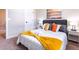 Serene bedroom with a well-made bed, soft lighting, and a relaxing atmosphere at 7951 Haverhill Way, Kissimmee, FL 34747