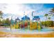 Colorful splash pad with slides and water features, perfect for Gathering fun in the sun at 7951 Haverhill Way, Kissimmee, FL 34747
