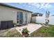 Cozy patio with sliding glass doors and a privacy fence, great for outdoor entertaining at 8615 N Rindge Rd, Polk City, FL 33868