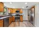 Well-equipped kitchen with stainless steel appliances and abundant cabinet space at 897 Shed St, Oviedo, FL 32765