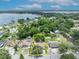 An aerial view showing property lines around a single-Gathering home, surrounded by mature trees at 906 25Th Nw St, Winter Haven, FL 33881