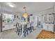 Inviting kitchen with a charming dining area, ideal for Gathering meals and entertaining, enhanced by ample natural light at 906 25Th Nw St, Winter Haven, FL 33881