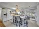 Bright and spacious kitchen with a dining area, perfect for casual meals and gatherings, enhanced by stylish decor at 906 25Th Nw St, Winter Haven, FL 33881
