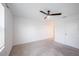 Bright bedroom featuring neutral carpet, white walls and trim, and a ceiling fan at 9199 Waverly Walk Dr, Orlando, FL 32817