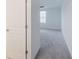 Light and bright bedroom showcasing neutral walls and carpet at 9199 Waverly Walk Dr, Orlando, FL 32817