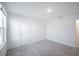 Bedroom with plush neutral carpet, a window, and white walls and trim at 9199 Waverly Walk Dr, Orlando, FL 32817