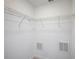 Walk-in closet with white walls and wire shelving at 9199 Waverly Walk Dr, Orlando, FL 32817