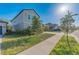 Charming two-story home with manicured lawn and mature landscaping at 9199 Waverly Walk Dr, Orlando, FL 32817
