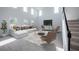 Bright living room boasts soaring ceilings and plenty of natural light at 9199 Waverly Walk Dr, Orlando, FL 32817