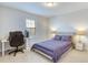 Bedroom with a modern desk and bed, perfect for relaxing or getting some work done at 9422 Jaywood Rd, Winter Garden, FL 34787