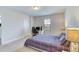 Bedroom with a modern desk and bed, perfect for relaxing or getting some work done at 9422 Jaywood Rd, Winter Garden, FL 34787