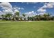 Community green space showcasing walking paths, benches, and landscaped grounds for outdoor enjoyment at 9422 Jaywood Rd, Winter Garden, FL 34787