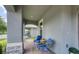 Cozy front porch with comfortable seating, creating a welcoming outdoor space for relaxation at 9422 Jaywood Rd, Winter Garden, FL 34787