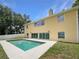 Backyard with swimming pool, patio, and direct access to the home at 10170 Se 106Th Ln, Belleview, FL 34420
