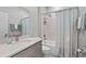 Inviting bathroom featuring a shower-tub combo with decorative curtain and a single sink vanity with a stone countertop at 1020 Taproot Dr, Winter Springs, FL 32708