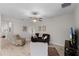 Cozy living room featuring neutral colors, wood-look flooring, and comfortable seating at 1020 Taproot Dr, Winter Springs, FL 32708