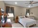 Relaxing main bedroom with neutral walls, plush bedding, and a ceiling fan at 1020 Taproot Dr, Winter Springs, FL 32708