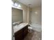 Bathroom featuring a single vanity and a shower and bathtub combo at 11187 Savannah Landing Cir, Orlando, FL 32832