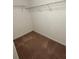Walk in closet with carpet flooring and wire shelving for optimal storage at 11187 Savannah Landing Cir, Orlando, FL 32832