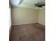 Main bedroom featuring a ceiling fan and a window for natural light at 11187 Savannah Landing Cir, Orlando, FL 32832