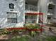 Condo exterior view featuring the outdoor patio space and landscaping at 11568 Westwood Blvd # 1015, Orlando, FL 32821