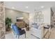 Cozy living room with modern decor, including a flat-screen TV and comfortable seating at 1219 Normandy Dr, Haines City, FL 33844