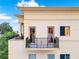 Exterior shot of a building featuring a private balcony with black iron railings at 140 E Morse Blvd # J, Winter Park, FL 32789