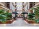 Interior courtyard featuring fountain, lounge seating, and dining area at 140 E Morse Blvd # J, Winter Park, FL 32789