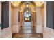 Arched walkway to courtyard with fountain, dining and lounge seating at 140 E Morse Blvd # J, Winter Park, FL 32789