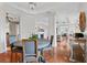 Elegant dining room with hardwood floors, tray ceilings, and open layout great for entertaining guests at 140 E Morse Blvd # J, Winter Park, FL 32789