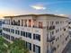 Building exterior featuring balconies, shutters, and intricate detailing at 140 E Morse Blvd # J, Winter Park, FL 32789