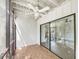 Enclosed patio with tile flooring, ceiling fan, and sliding glass doors leading to the inside at 1404 Oak Pl # A, Apopka, FL 32712